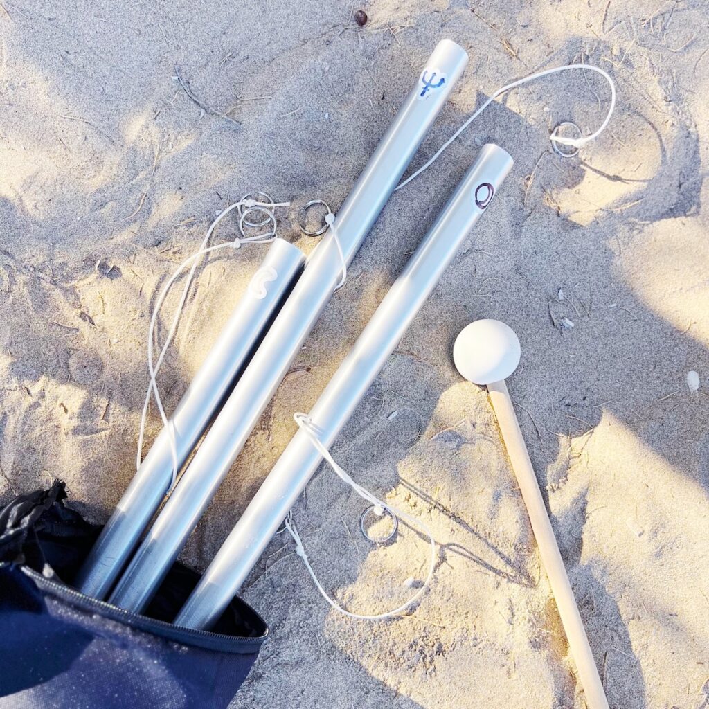 Planetary sound tubes on the sand of Kimolos Island, Greece. Part of the Cosmic Sounds Healing sessions using authentic acoustic instruments tuned to planetary frequencies.