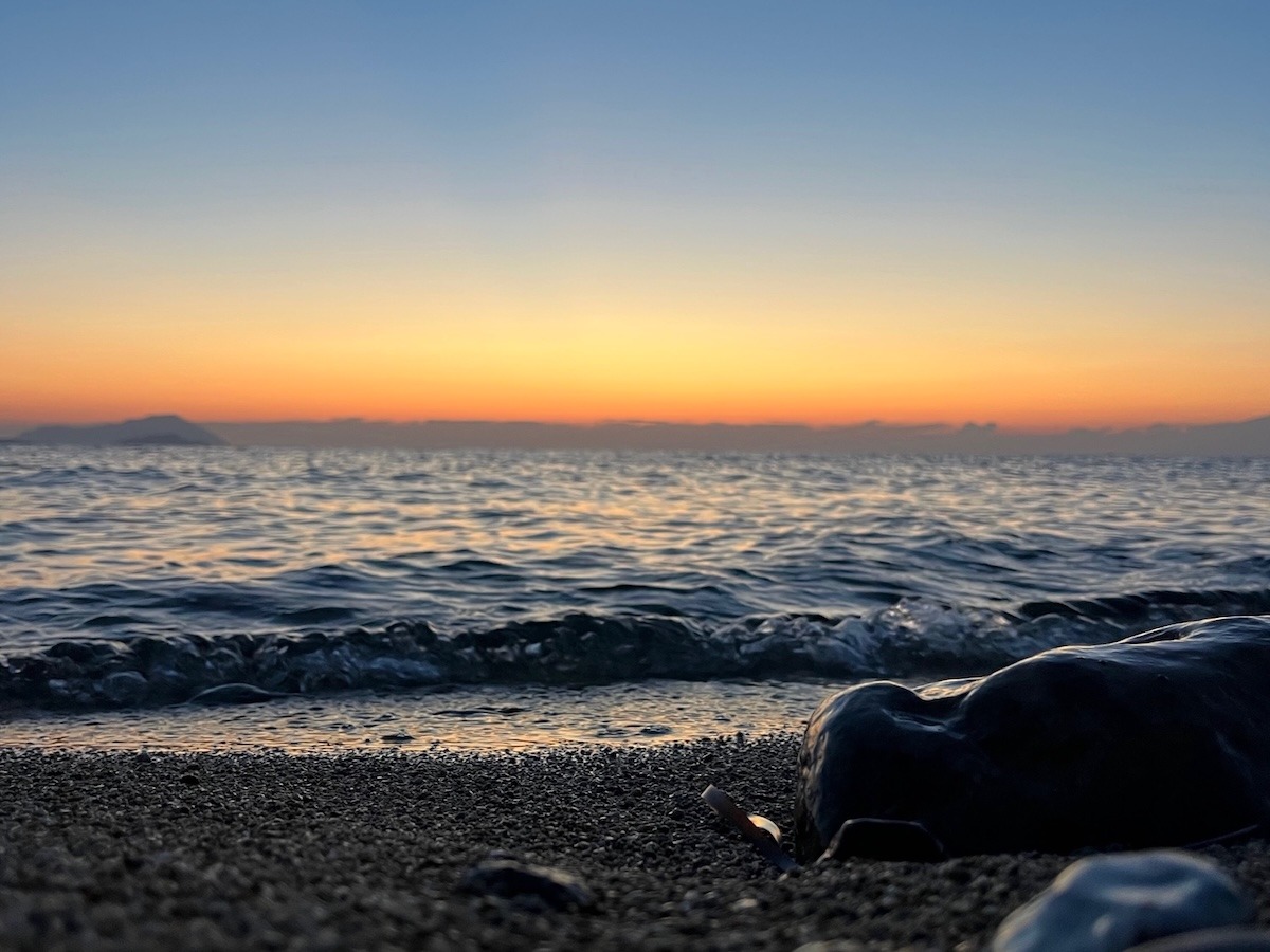 Aegean Sea at sunset on a quiet Cycladic island in Greece during a Sound Healing setting