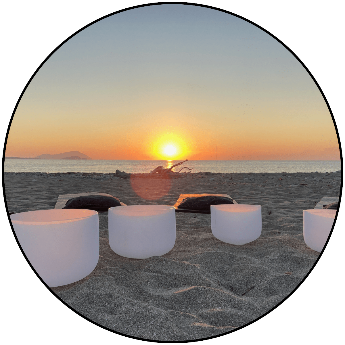 Sunset Sound Healing in Greece with acoustic sound bowls on a quiet Cycladic beach